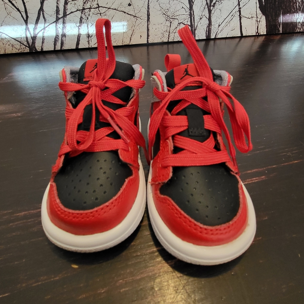 Baby Air Jordan shoes in classic red black and grey